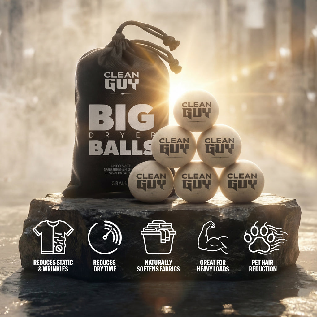 Clean Guy dryer balls with packaging on a stone surface