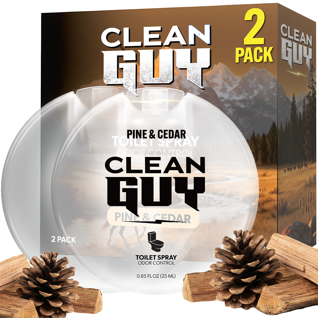 Clean Guy pine and cedar toilet spray packaging with two bottles and natural elements on a white background