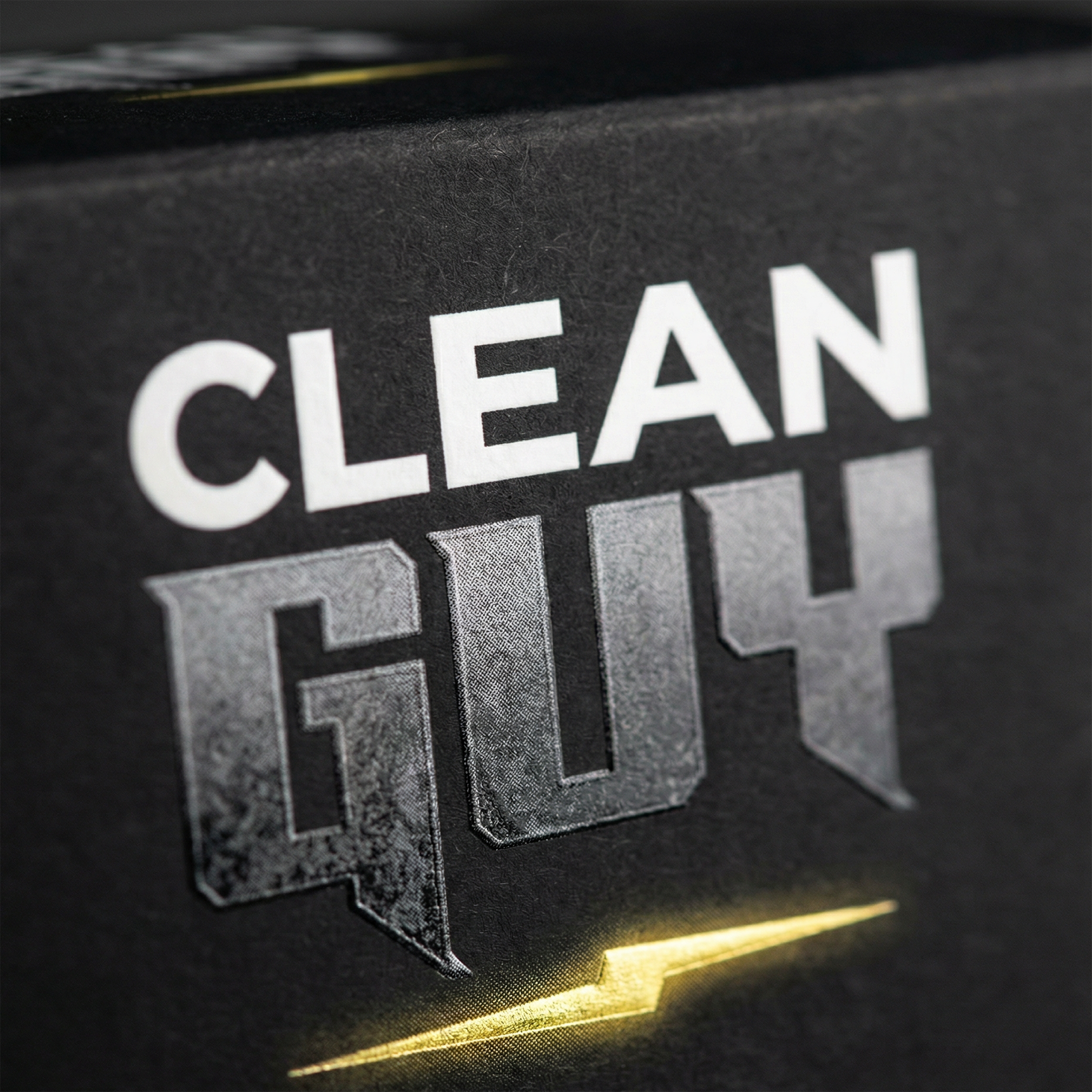 Close-up of a product with 'Clean Guy' branding on a dark background