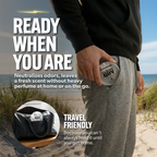 Person holding a container of 'Clean Guy' product on a beach with promotional text.