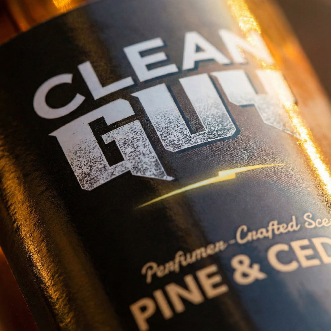 Close-up of a bottle labeled 'Clean Gut' with 'Pine & Cedar' scent.